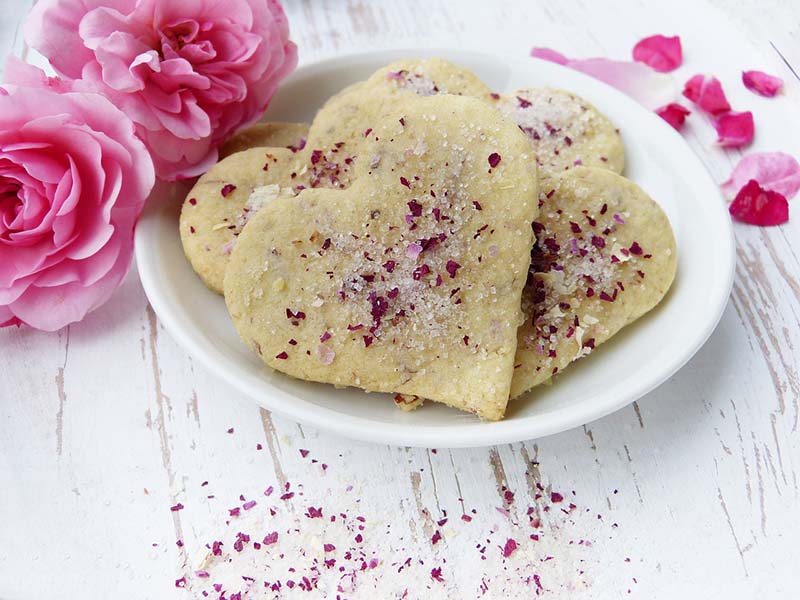 heart shaped valentine cookies sprinkled with flakes